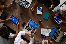 Enterprise IT team collaborating on unified device management